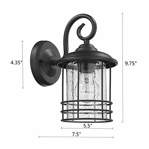 Black outdoor wall lantern with clear glass and metal frame.