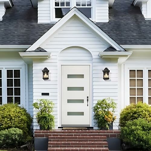 White front door with glass panels on a modern house.